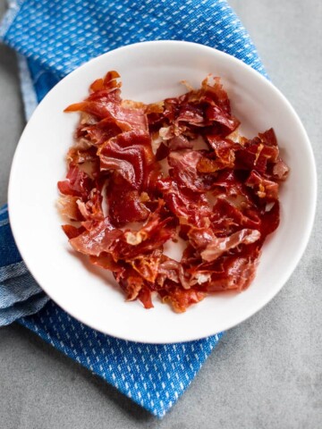 Crisp baked prosciutto makes a great snack, or crumble over pasta, salad or vegetables