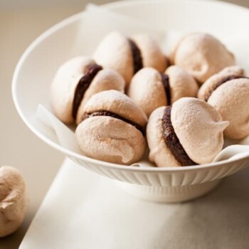 meringue cookies filled with chocolate and hazelnut