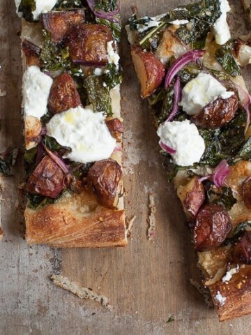 pan pizza with new potatoes, kale and ricotta cheese
