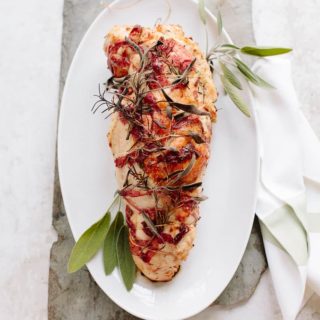 roasted turkey breast stuffed with herbed brioche breadcrumbs and wrapped in prosciutto