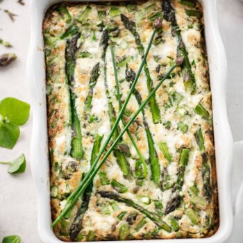 A baked frittata made with egg whites and chopped asparagus.