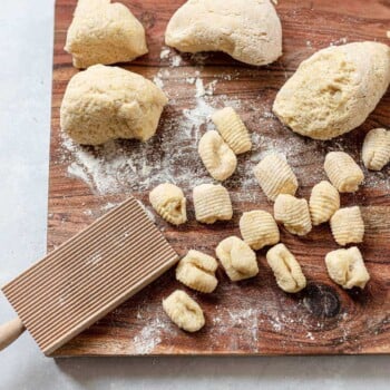 Homemade potato gnocchi on a wood board