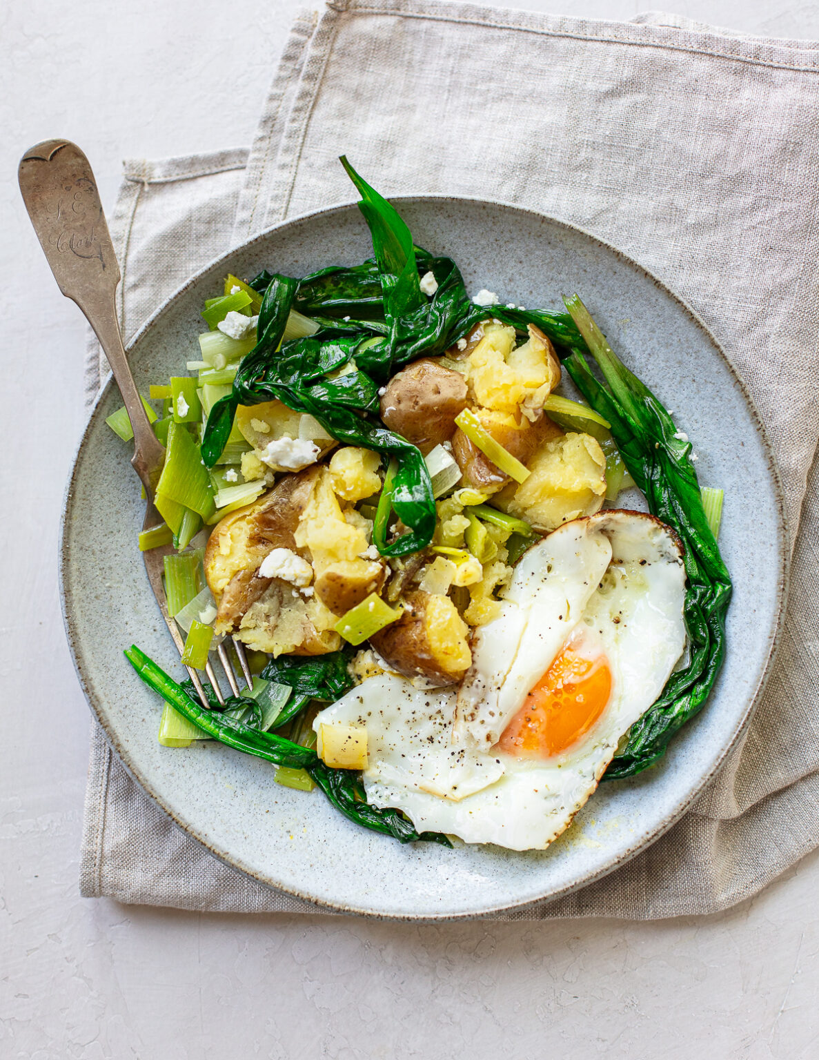 Ramp Leaves with Potatoes and Fried Egg Familystyle Food